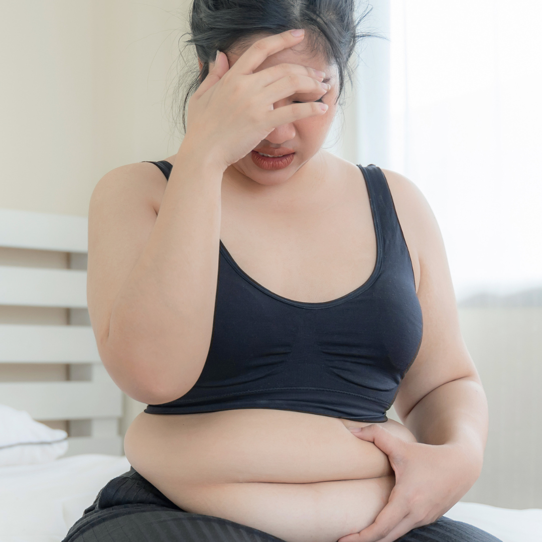 femme avec graisse au ventre medecine esthetique